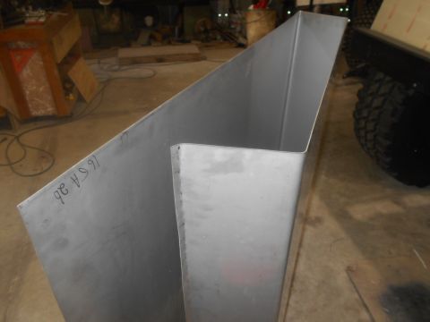 1992 Ford Bronco - A metal panel with handwritten markings is shown, with a tire visible in the background.