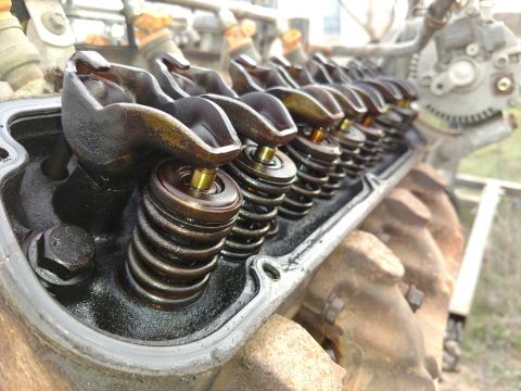 1996 Ford Bronco - Engine valve train components, including rocker arms and valve springs, are shown in detail.