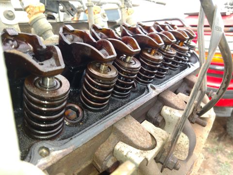 1996 Ford Bronco - The internal components of an engine, specifically the valve train, are shown in this close-up view.