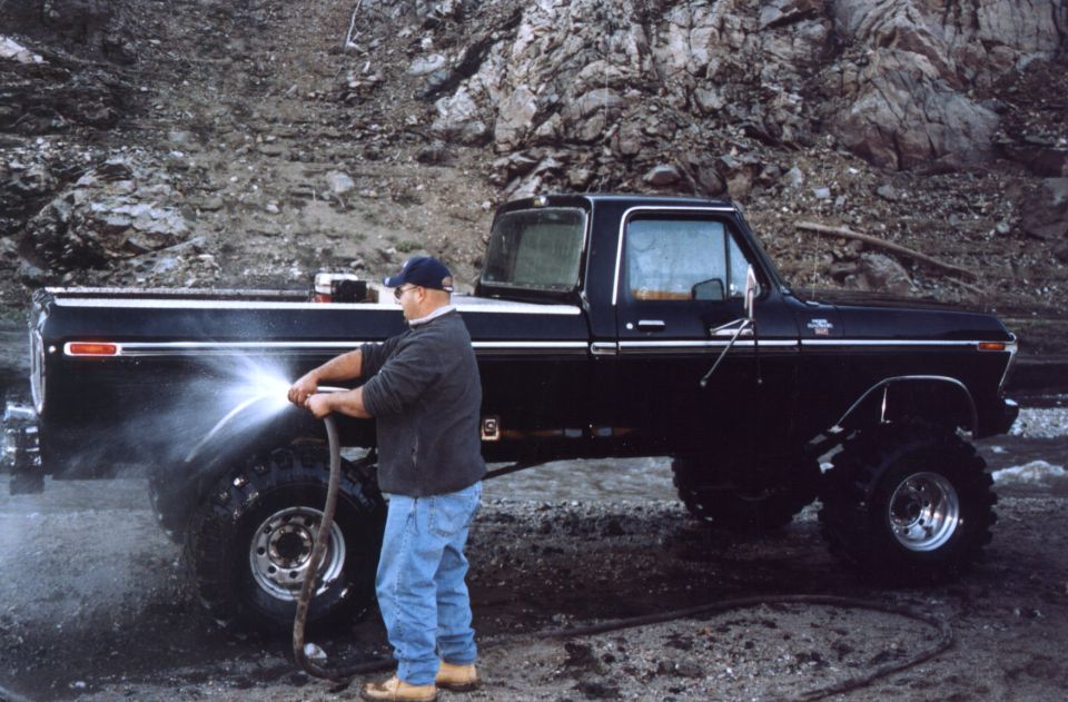 GIL WASHING TONYS TRUCK AT THE CANYON