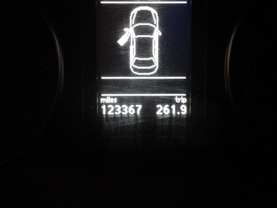 Car dashboard shows 123367 miles and 261.9 trip miles