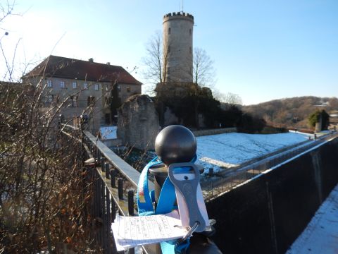 2010 Audi A4 - A castle and tower stand against a clear blue sky, with snow dusting the landscape below.
