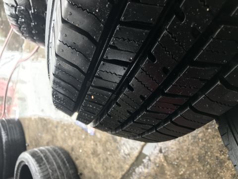 1997 Dodge 3500 - A detailed view of a tire's tread pattern, showing the grooves and sipes.