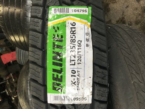 1997 Dodge 3500 - A new tire is displayed with its product information label clearly visible.