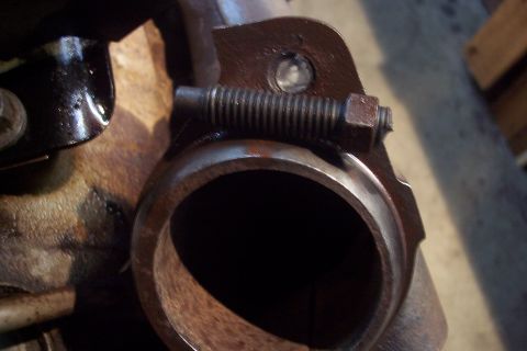 1995 Ford Bronco - Exhaust pipe flange connection detail, showing a bolt and spring mechanism.