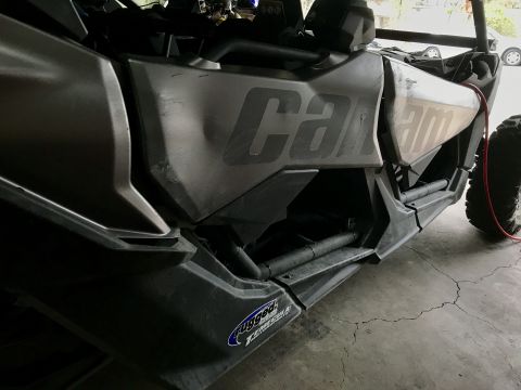 1988 Ford Bronco - This UTV has 'Can-Am' branding visible on its side panel, and a ' Terrain' sticker near the bottom.
