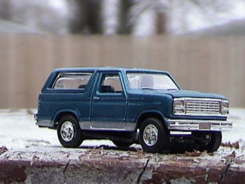 1979 Ford Bronco - This is a 1979 Ford Bronco toy car. It is blue with silver trim and has chrome wheels.