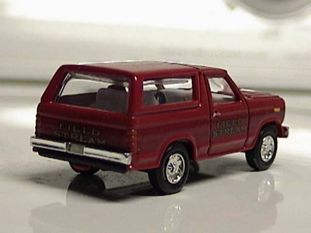 Red toy SUV with "FIELD STREAM" text on the side and rear