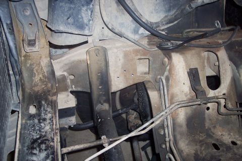 1995 Ford Bronco - Undercarriage view showing suspension and frame components, likely from a truck or SUV.