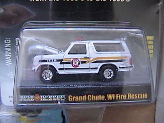 Toy fire rescue Bronco with Grand Chute, WI markings. Hood is open