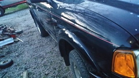 2003 Ford Ranger - Never did like pinstripes on single tone.