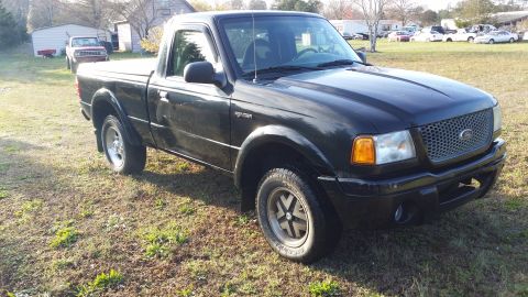 2003 Ford Ranger - Just a different angle. The torsion bars are cranked 5.25 turns. Sits just a bit tall in the front as is evident in the previous picture. H…