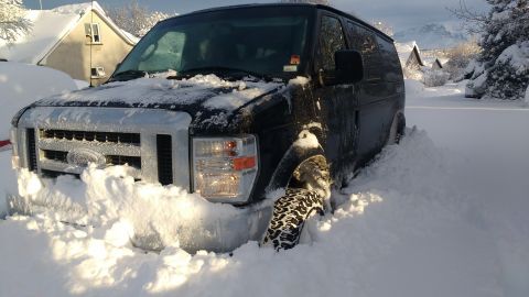 1996 Ford Bronco - Ford E-Series van buried in snow after a blizzard.