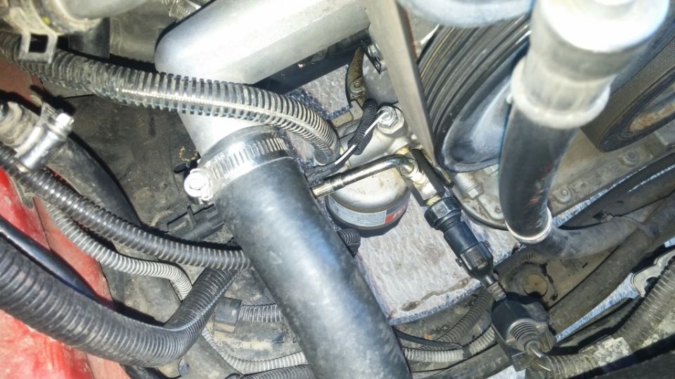 Engine bay hoses, clamps, and filter assembly