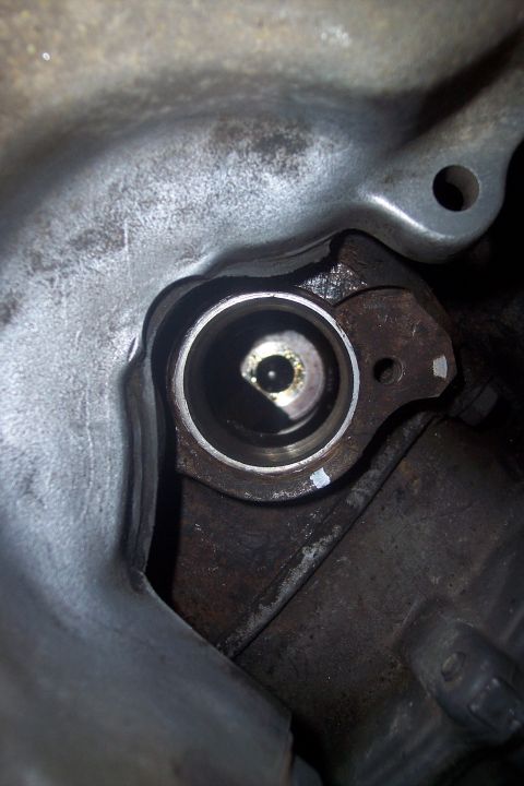 1995 Ford Bronco - Detail of an engine part, possibly a cylinder or bore, showing internal wear or residue.
