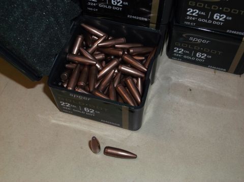1995 Mercury Grand Marquis - A box of Speer Gold Dot .224 caliber 62 grain bullets is shown, with loose rounds in front.