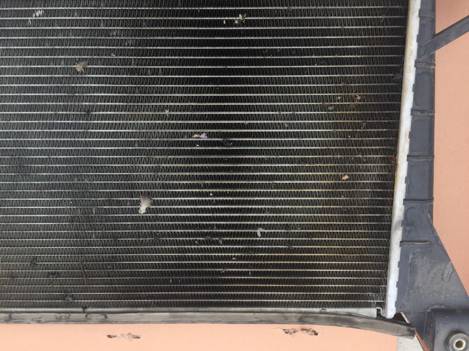 Radiator with Supermotors.net logo