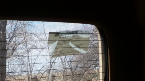 1985 Ford Bronco - Sticker on a rear window shows 'Bronc 1984 1985' and other text.