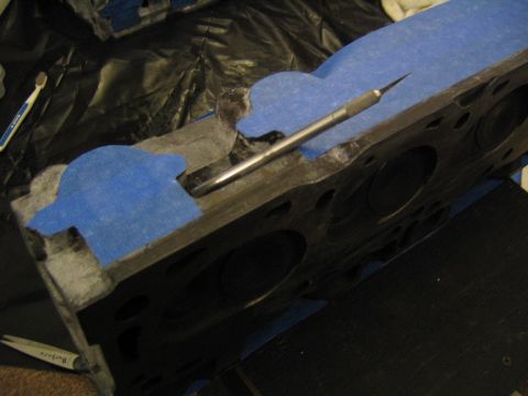 1978 Ford Bronco - Cutting out new tape covers for the exhaust ports. The valve cover, intake and spark plug covers were fine, just replace the combustion cha…