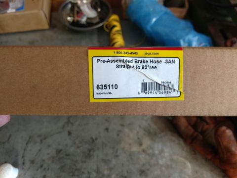 1992 Ford Bronco - 48 inch teflon coated/braided brake hose from Jegs. This will run from the passenger side caliper to the center drop.