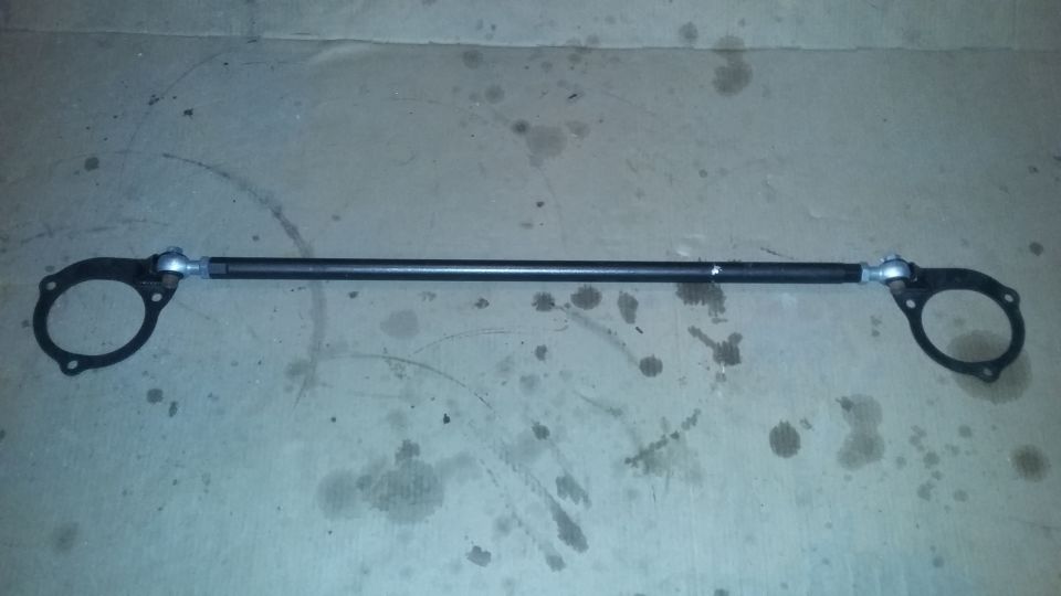 Black strut bar with circular mounting plates