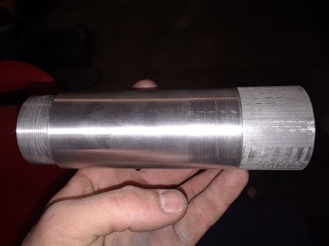 1994 Ford Bronco - Close-up of a machined metal part with visible text markings.