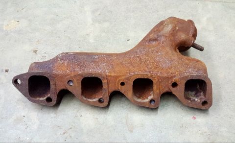 1973 Ford Mustang - This is a rusted exhaust manifold, not a 1973 Ford Mustang.