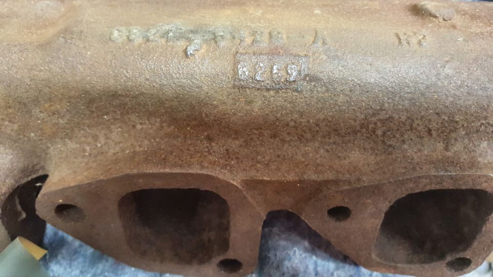 Exhaust manifold with casting numbers 6259 and WY