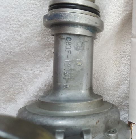 1973 Ford Mustang - This is a close-up of an automotive distributor cap, not a 1973 Ford Mustang.