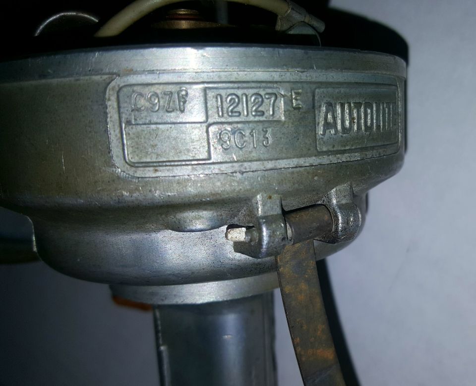 Automotive part with numbers 9Zf 12127 E 9C13