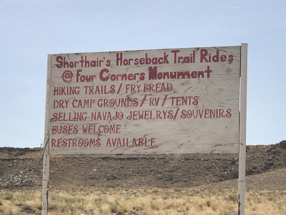 Sign for Shorthair's Horseback Trail Rides at Four Corners Monument.