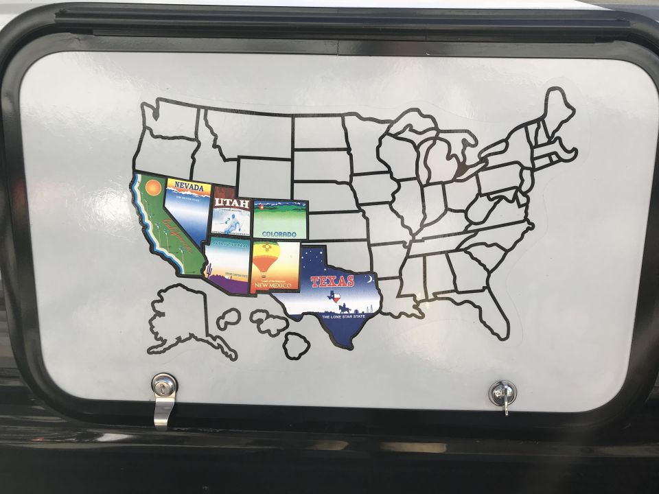 Sticker of the US map with state stickers including California, Nevada, Utah, Colorado, Arizona, New Mexico, and Texas.