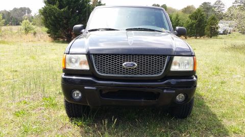 2003 Ford Ranger - Front bumper is pretty messed up. Does not look bad in this picture but it is falling apart.