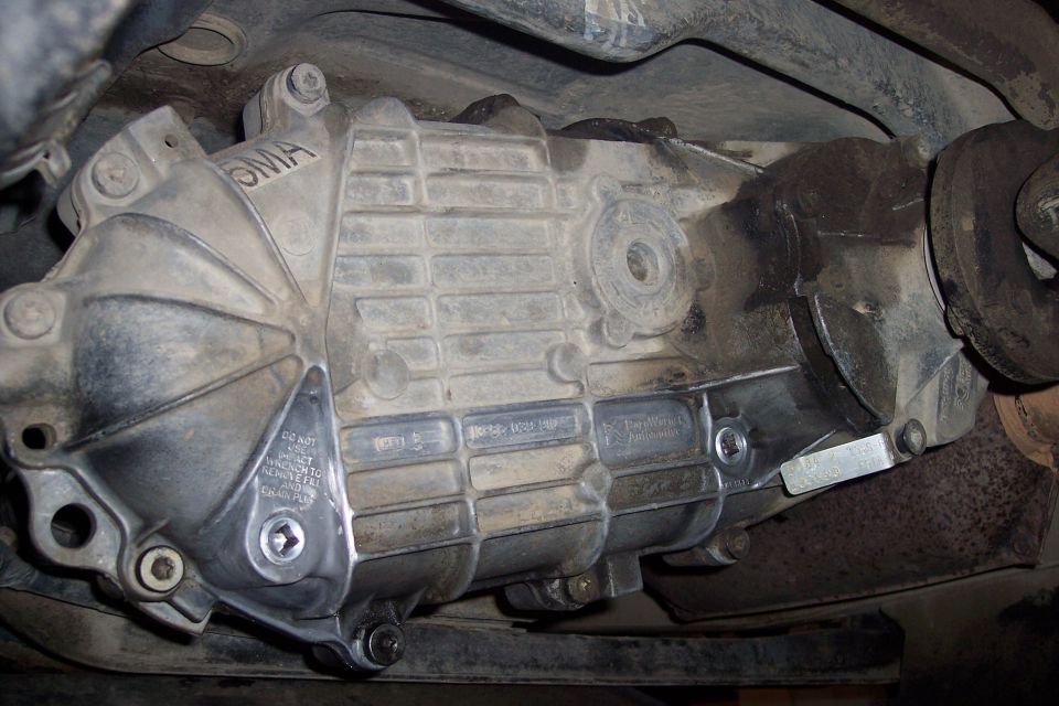 Underside of a 1995 Ford Bronco showing the transfer case.