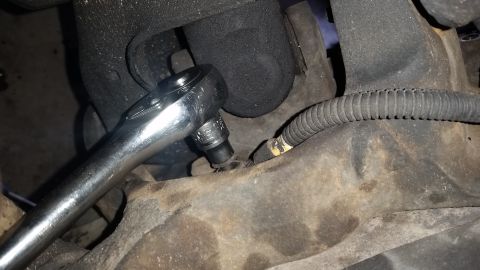 1996 Ford Bronco - Don't forget this sucker. It is a small bolt that threads into the spindle from behind. Can't get the spindle off without this being gone,…