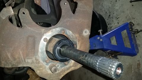 1996 Ford Bronco - This is the view with the spindle off. Notice the inner spindle seal--this should be replaced while you have things apart. At this point th…