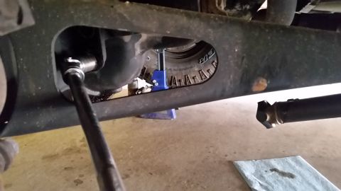 1996 Ford Bronco - Next we remove the two large bolts that help secure the 3rd member to the TTB. There are two, and they are typically not easy to remove wit…