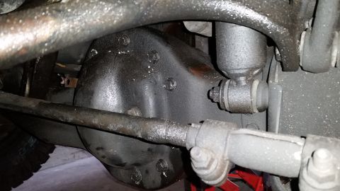 1996 Ford Bronco - With the exception of the uppermost bolt, remove all of these. You'll want to loosen the top bolt enough to be able to swing the 3rd member…