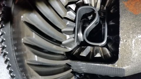 1996 Ford Bronco - Here is a C-clip in its natural habitat. It serves to keep the axle from sliding out of the axle housing, and normally lives a reclusive li…