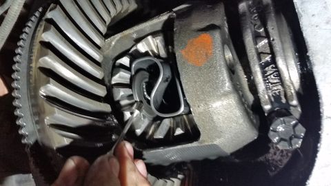 1996 Ford Bronco - Push in on both axles to expose the C-clip further. They can then be removed with some needle nosed pliers, or as I did, with a small magne…