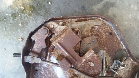 1985 Ford Bronco - Close-up view of a heavily rusted mechanical assembly, likely a component from a vehicle's repair.