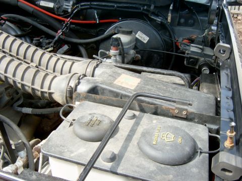 1995 Ford Bronco - The factory setup, the breather tube goes into the air box towards the rear. (You can see it just behind the box)