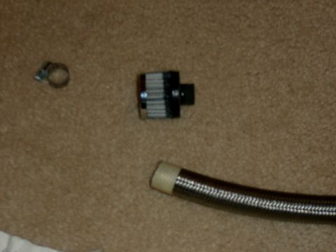 1995 Ford Bronco - I bought a K&N crank case vent filter (summit part #KNN-62-2470) and a 3’ piece of -10AN braided stainless tubing, which was mostly for loo…