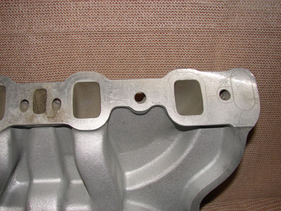 Silver aluminum intake manifold with four ports