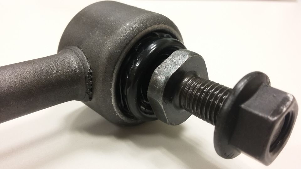 Automotive sway bar end link with rubber bushing and hardware