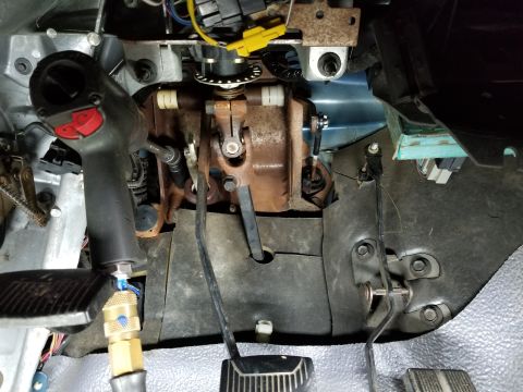 1995 Ford F-150 - The clutch engaged too close to the firewall, so before the pedal shaft wore into the steel pedal box, I pulled the pedals down to repair i…