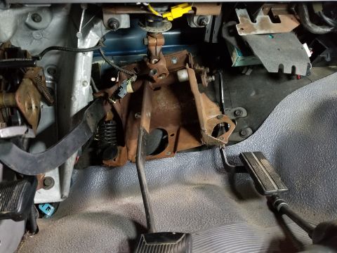 1995 Ford F-150 - The assembly comes straight down the firewall, and out into the footwell.