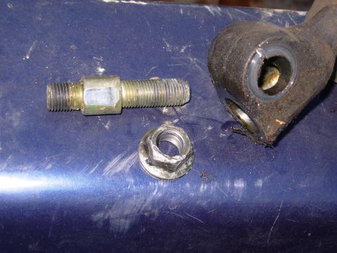 1983 Ford Bronco - Shifter Bolt for Mazda M5OD-R2 To remove the shifter, remove the nut, and thread it onto the exposed threads on the other side of the shift…