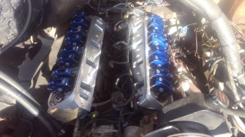 1990 Ford F-250 - new cylinder heads on. unfortunately my original Explorer valve covers did not clear the rockers. a set of stock truck covers did clear wit…