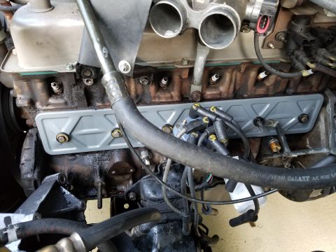 1995 Ford F-150 - I forgot to put the wiring harness hanger under the 4th & 6th cover bolts, but it's going back together.
